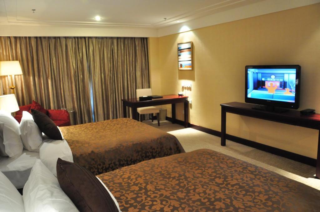 New Cozy Harbour Hotel Наньнин Номер фото